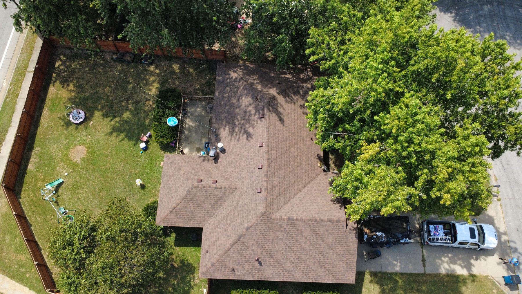 Drone view of a completed CRE Roofing shingle roof on an Oklahoma home