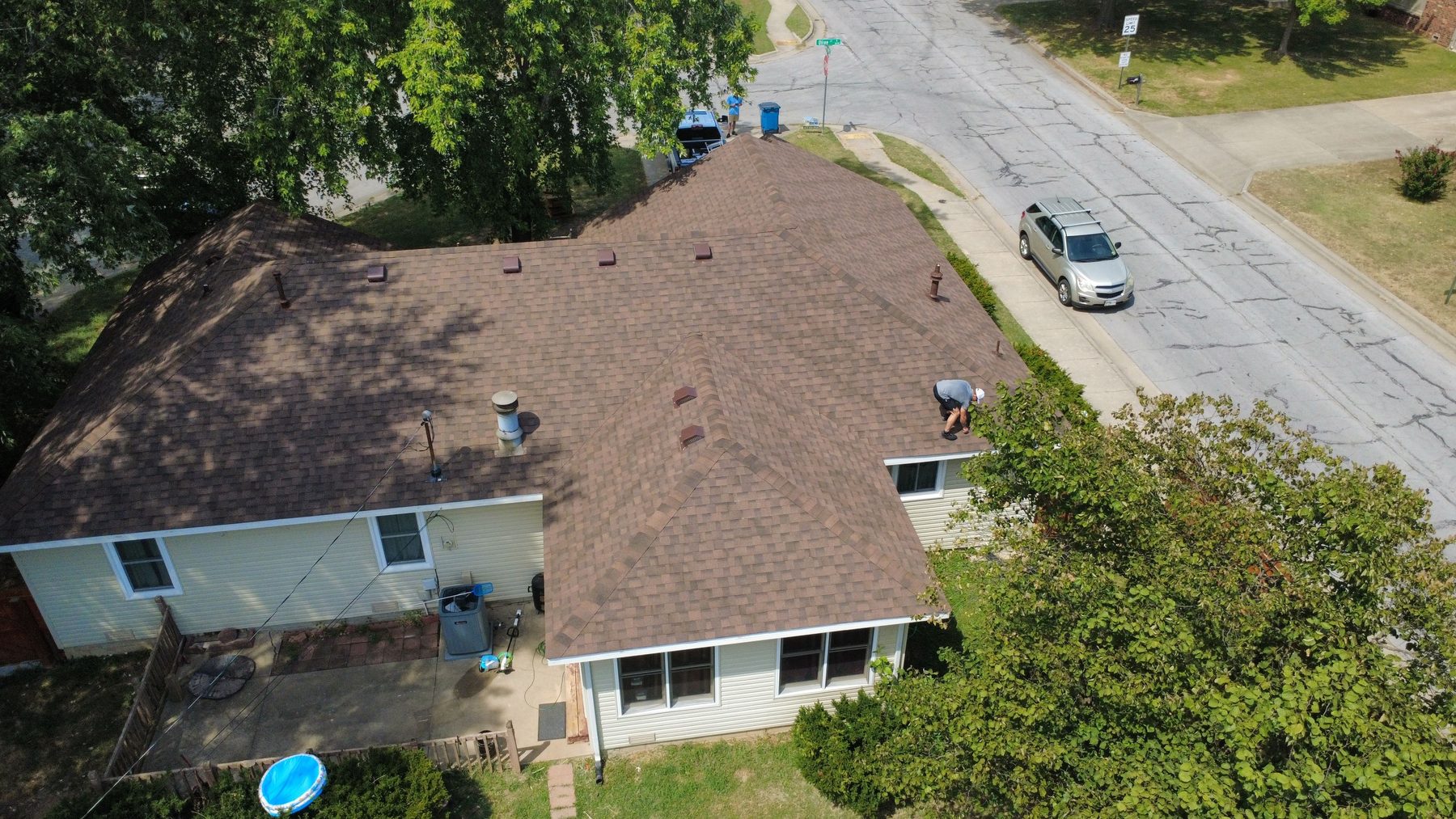 Drone view of a finished roof on a suburban Oklahoma City home