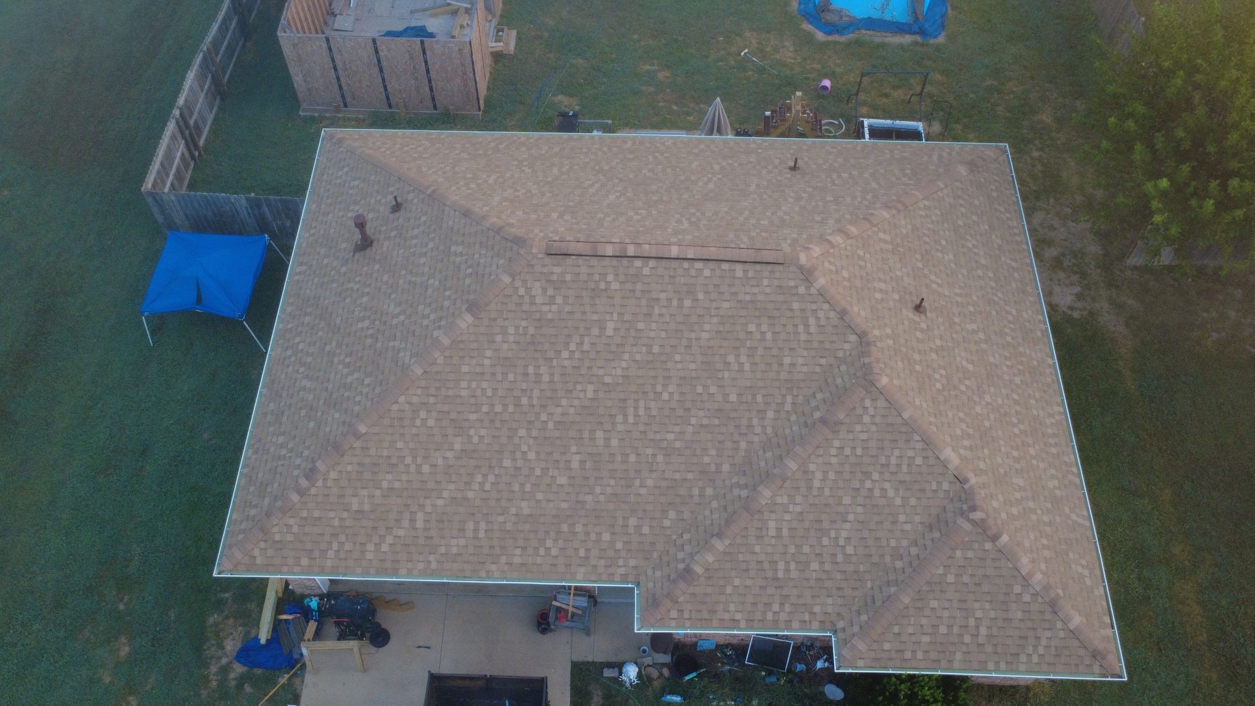 Overhead drone view of a finished roof replacement in Oklahoma